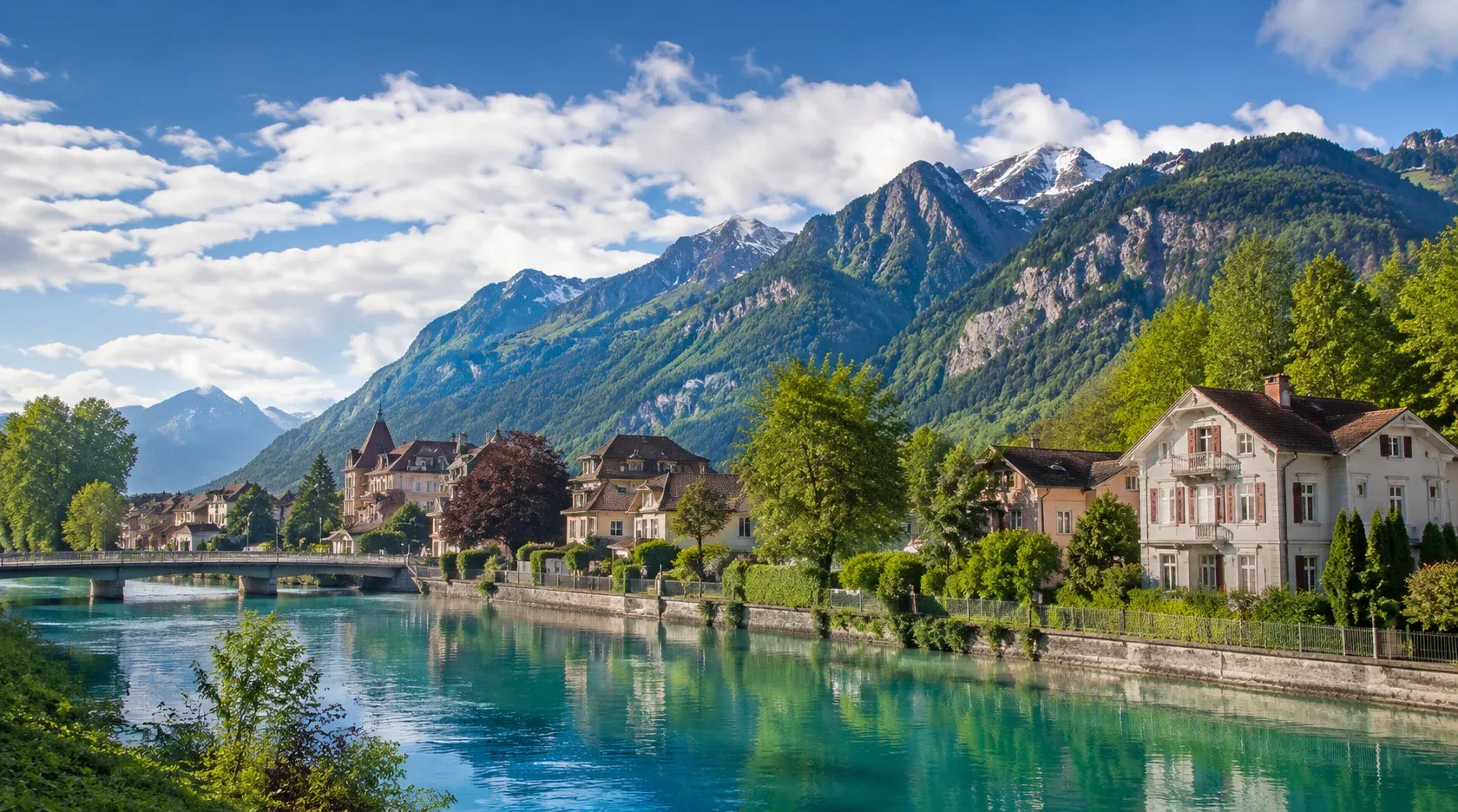 Paragliding over Interlaken with mountain views
