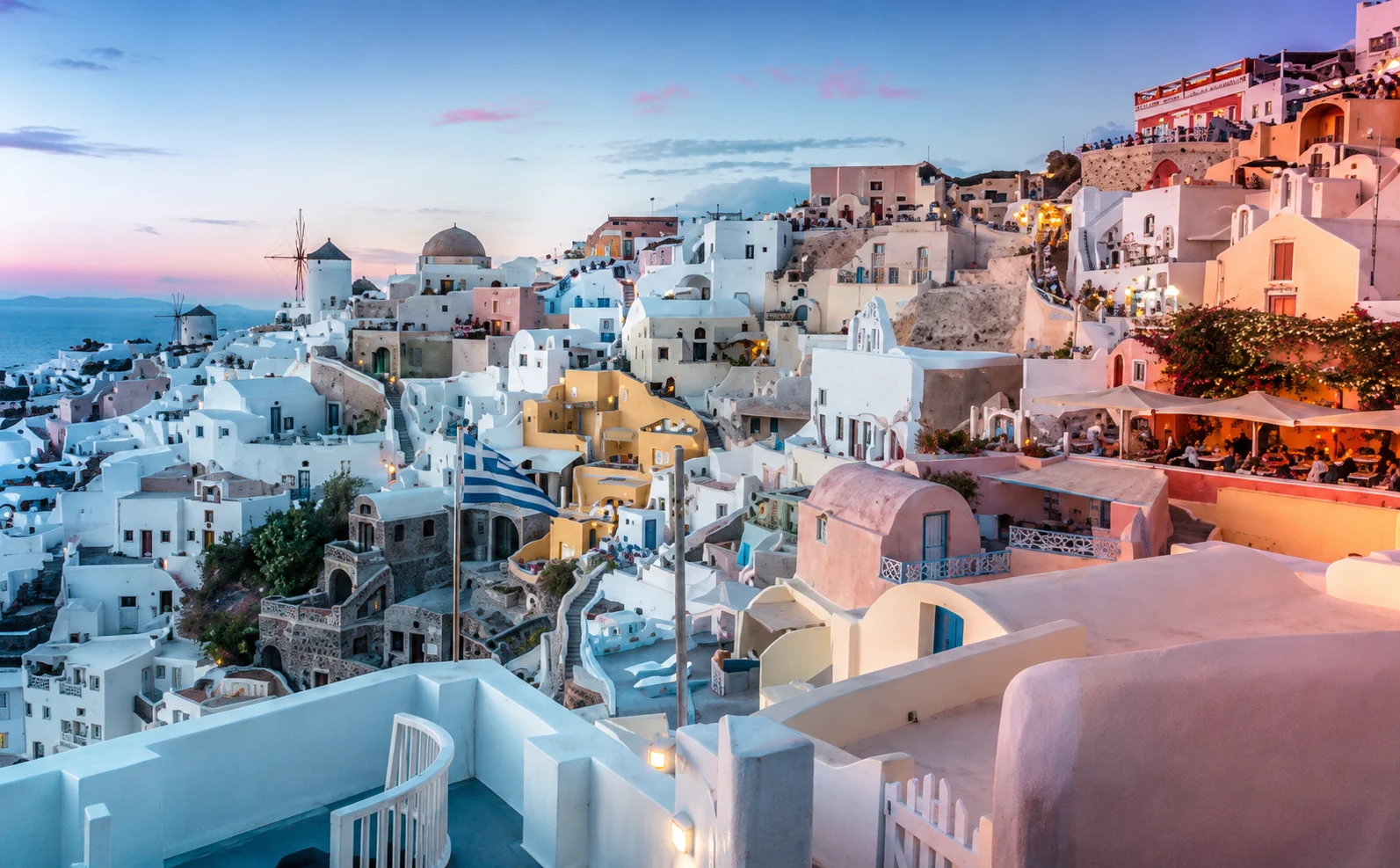Santorini Greece with white buildings and sunset views