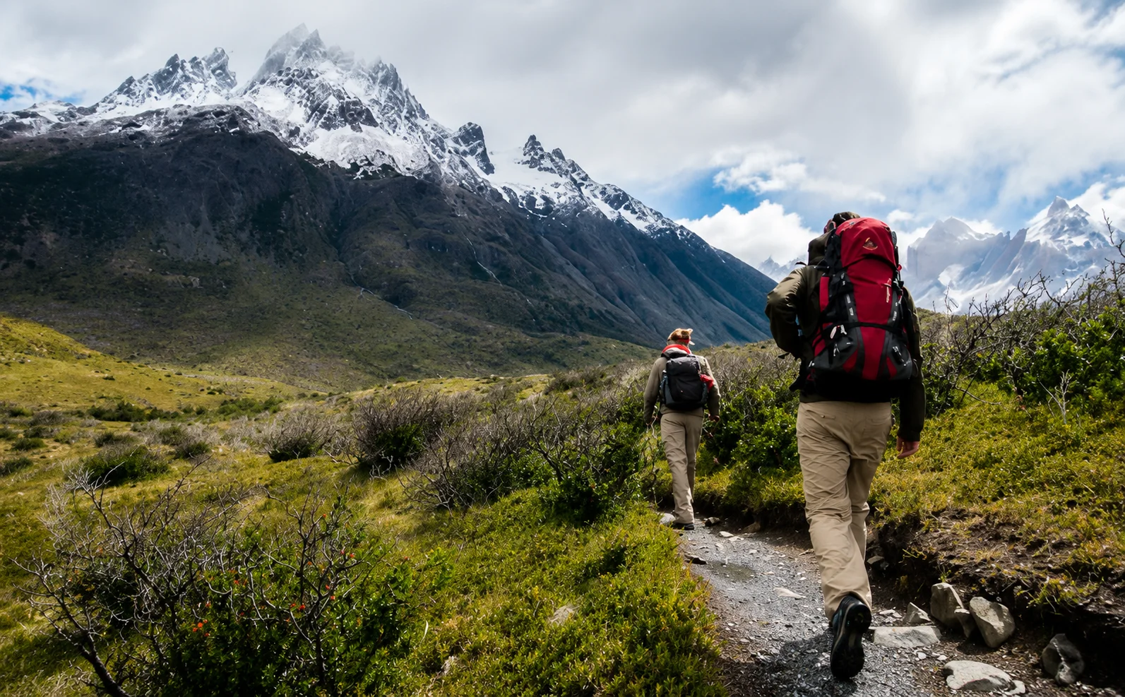 Travelers enjoying a peaceful mountain holiday with scenic views